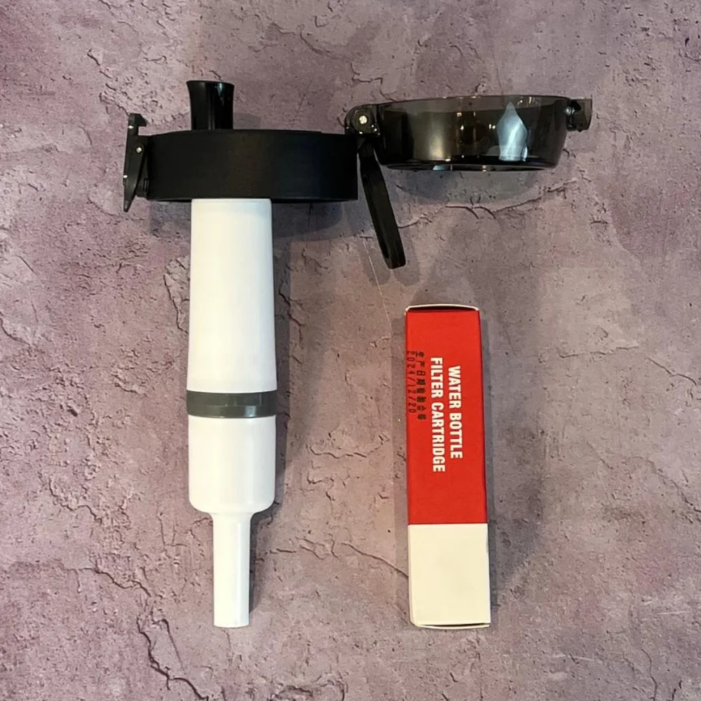 Garrafa 600ml Preta com Filtro de Carvão Ativado até 1200L