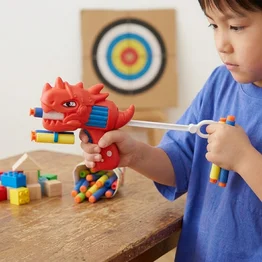 Pistola Lança Dardos Dinossauro com Projéteis Infantil